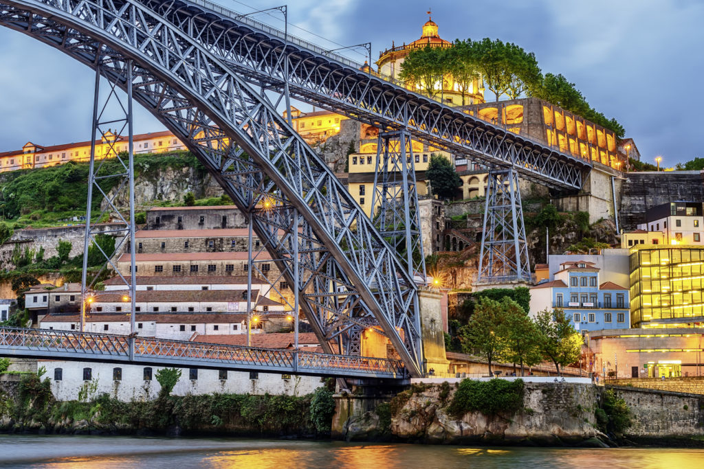 Porto, Portugal: the Dom Luis I Bridge and the Serra do Pilar Monastery on the Vila Nova de Gaia side at sunset